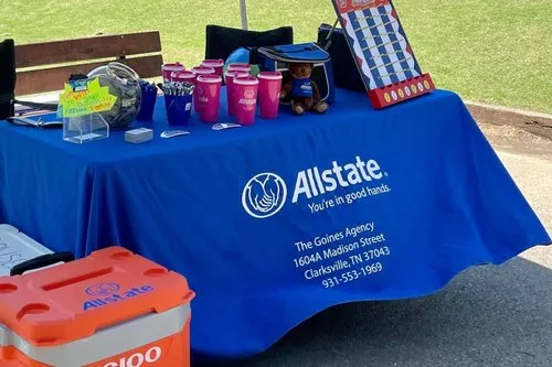 A Goines Agency community table stocked with games, treats, and a little summer fun.