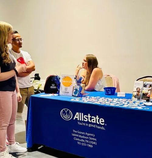The Goines Agency connects with neighbors at an indoor community event.